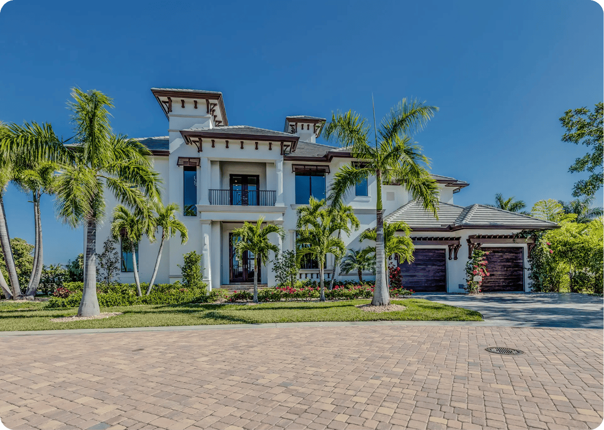 Elegant home with tiled driveway