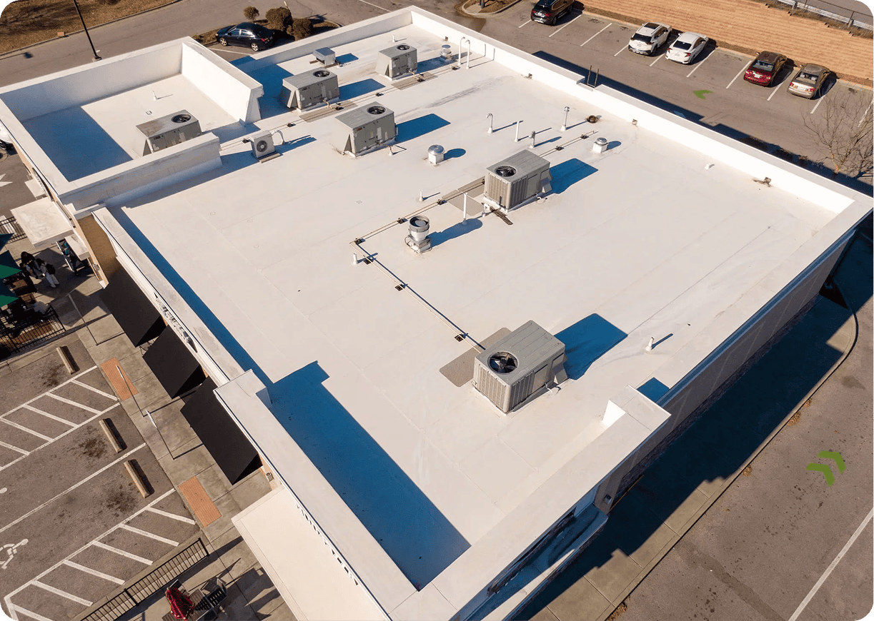 White commercial roof with ventilation systems