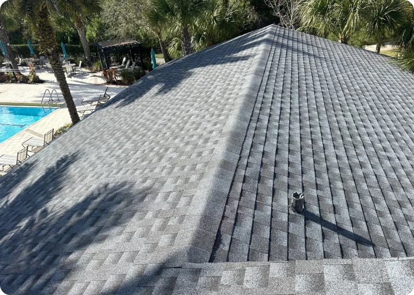 Shingled roof with poolside view