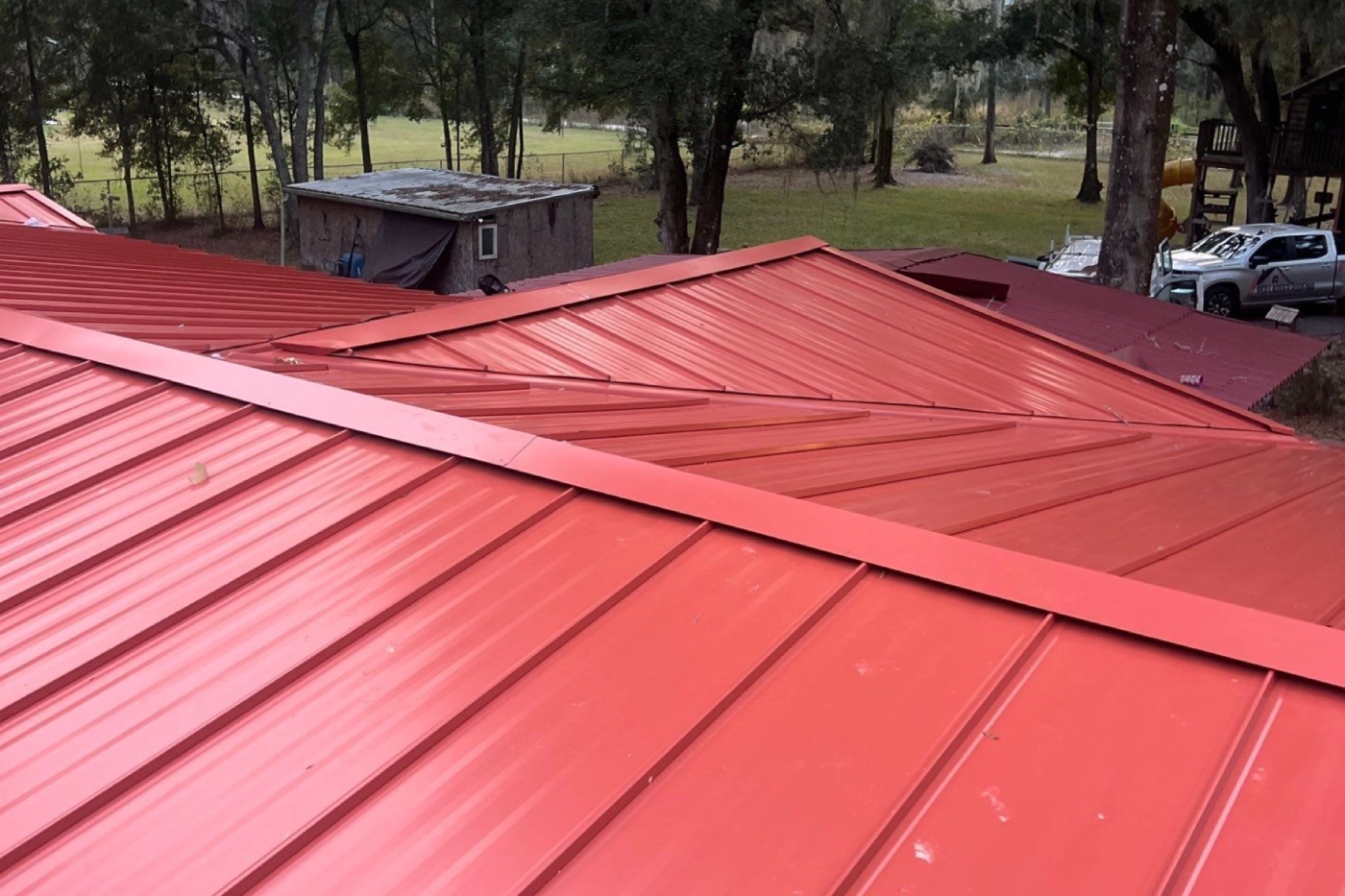 Overhead view of red metal roofing